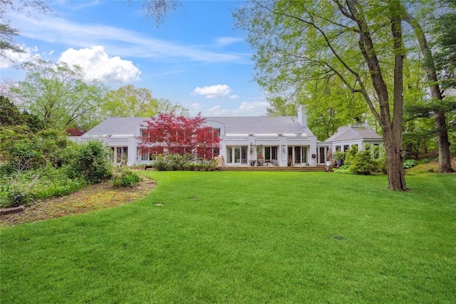 80 Valentines Ln, Old Brookville, NY 11545 - rear view of house featuring a lawn and a deck