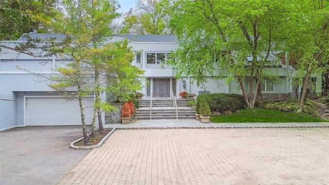 80 Valentines Ln, Old Brookville, NY 11545 - view of front facade with asphalt driveway and a garage