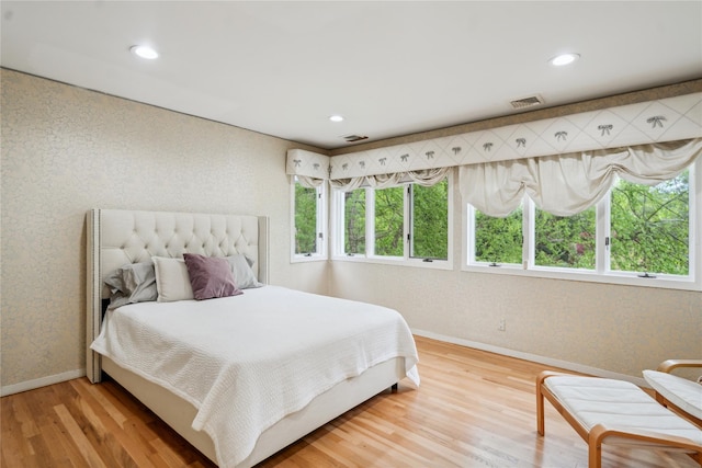 80 Valentines Ln, Old Brookville, NY 11545 - bedroom featuring wood finished floors, recessed lighting, and wallpapered walls