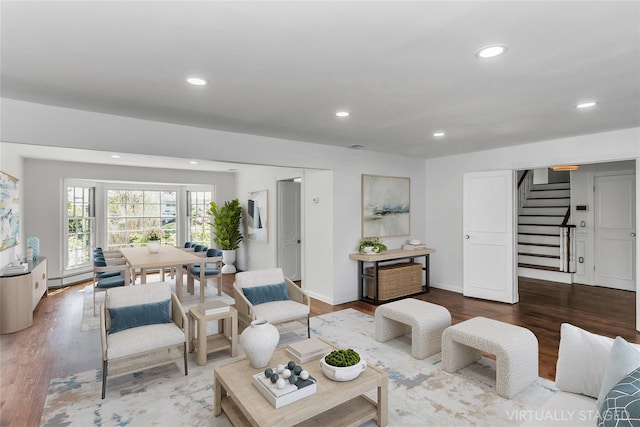1402 Bay Blvd, Atlantic Beach, NY 11509 - living room with stairs, wood finished floors, recessed lighting, and baseboard heating