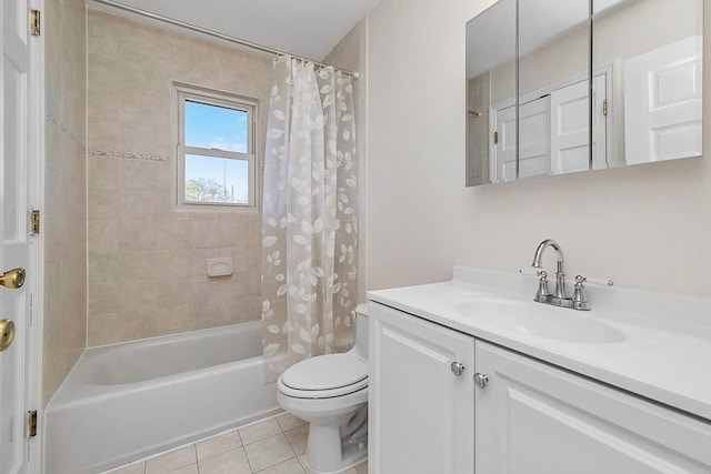 full bathroom featuring tile patterned flooring, shower / tub combo, toilet, and vanity