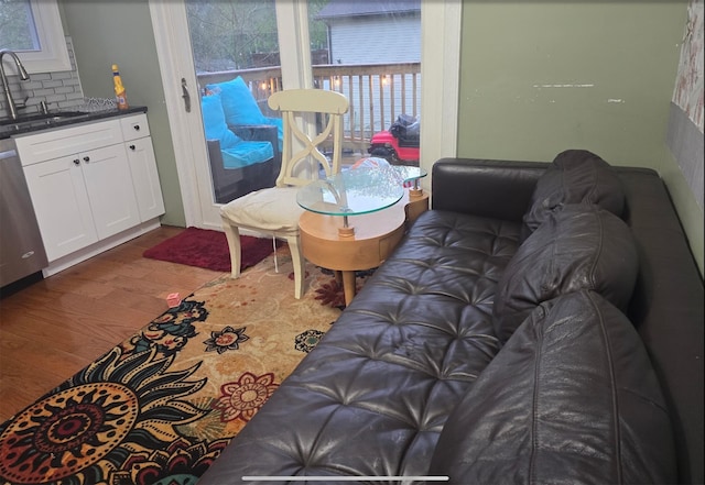living room featuring a wealth of natural light and wood finished floors