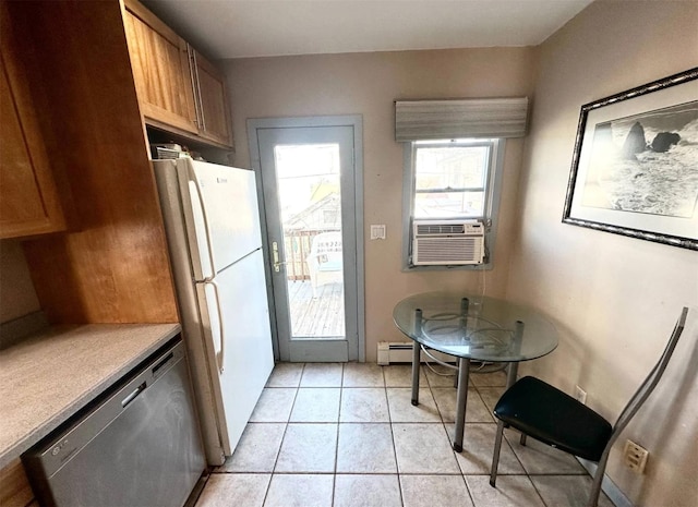 30 Delaware Ave, Long Beach, NY 11561 - kitchen with cooling unit, stainless steel dishwasher, freestanding refrigerator, light countertops, and light tile patterned flooring