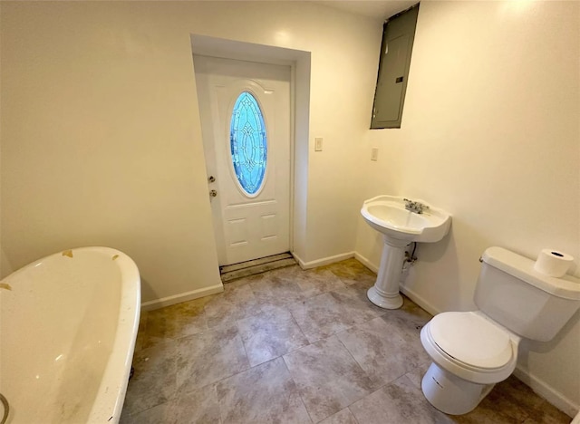 30 Delaware Ave, Long Beach, NY 11561 - bathroom with toilet, electric panel, tile patterned flooring, and baseboards