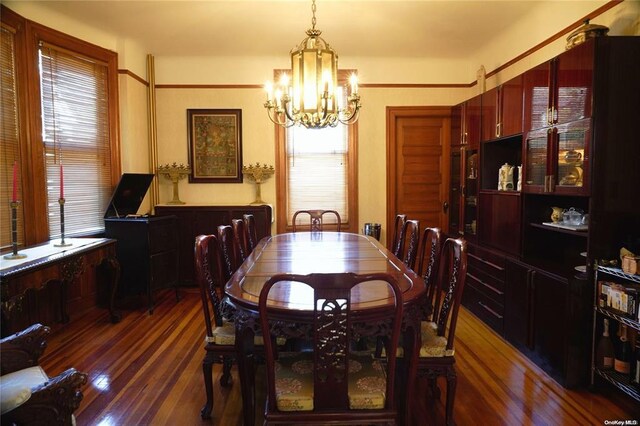 3 Beech Court Cir, College Point, NY 11356 - dining room with a chandelier and wood finished floors