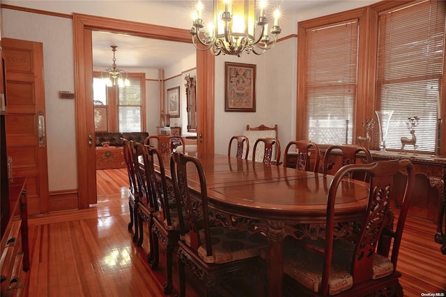 3 Beech Court Cir, College Point, NY 11356 - dining room with a chandelier and light wood-style floors