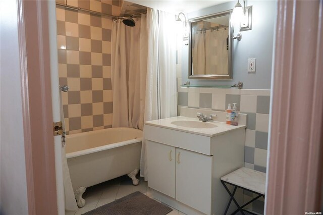 3 Beech Court Cir, College Point, NY 11356 - bathroom featuring shower / bath combo with shower curtain, tile patterned floors, tile walls, and vanity