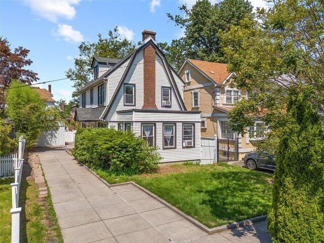 47-18 163rd St, Flushing, NY 11358 - view of front facade with a chimney