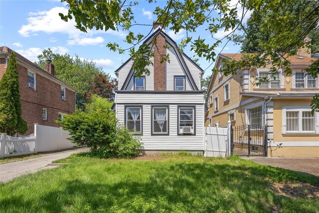 47-18 163rd St, Flushing, NY 11358 - dutch colonial featuring a gate
