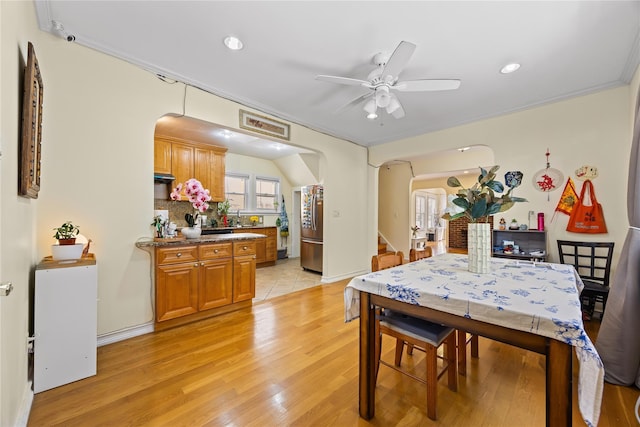 47-18 163rd St, Flushing, NY 11358 - dining space with arched walkways, a ceiling fan, light wood finished floors, recessed lighting, and crown molding