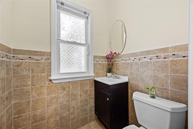 47-18 163rd St, Flushing, NY 11358 - bathroom with tile walls, vanity, and wainscoting