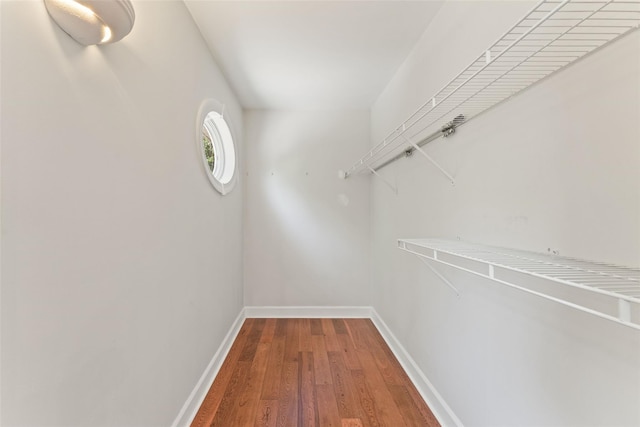 spacious closet with wood finished floors