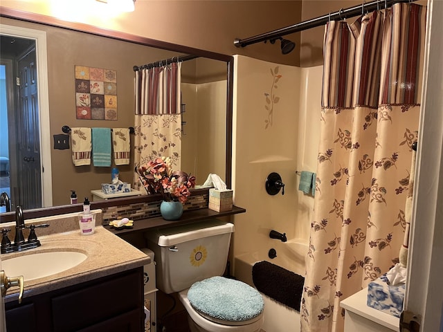 bathroom featuring vanity, toilet, and shower / bathtub combination with curtain