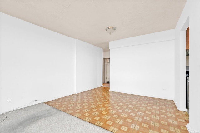 empty room featuring light floors