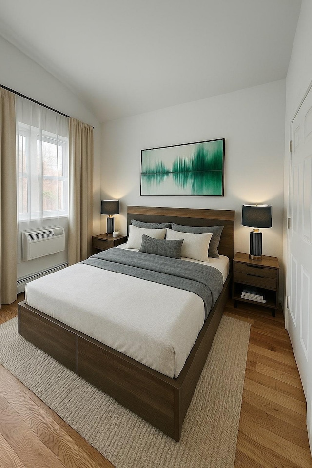 bedroom featuring a baseboard radiator, a wall mounted AC, vaulted ceiling, and wood finished floors