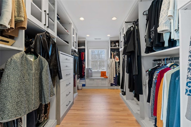 walk in closet featuring light wood-style floors and visible vents