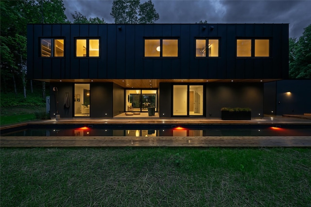 474 Rte 199, Red Hook, NY 12571 - back of house with an outdoor pool, board and batten siding, and stucco siding