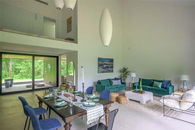 474 Rte 199, Red Hook, NY 12571 - dining area with tile patterned floors and a towering ceiling