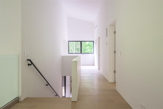 474 Rte 199, Red Hook, NY 12571 - hallway featuring an upstairs landing, light wood-style floors, and a high ceiling