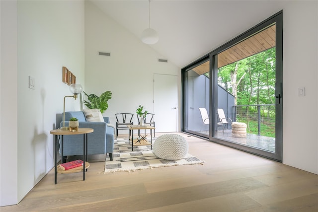 474 Rte 199, Red Hook, NY 12571 - doorway to outside featuring wood finished floors and high vaulted ceiling