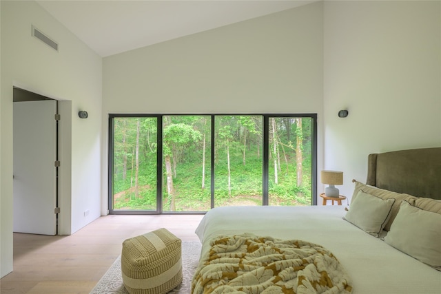 474 Rte 199, Red Hook, NY 12571 - bedroom with high vaulted ceiling and wood finished floors