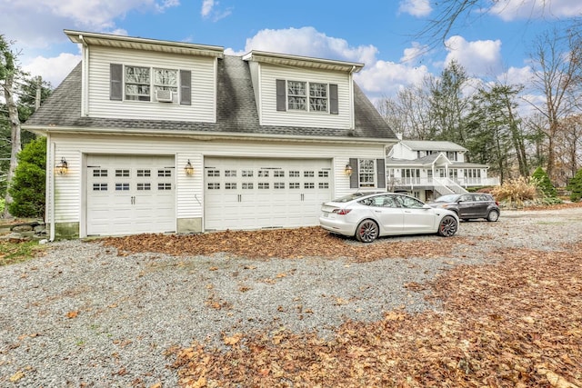 121 Thiells Rd, Stony Point, NY 10980 - view of front of house featuring driveway and roof with shingles