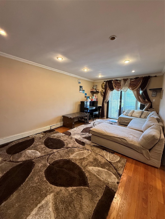 living area with ornamental molding, recessed lighting, and wood finished floors