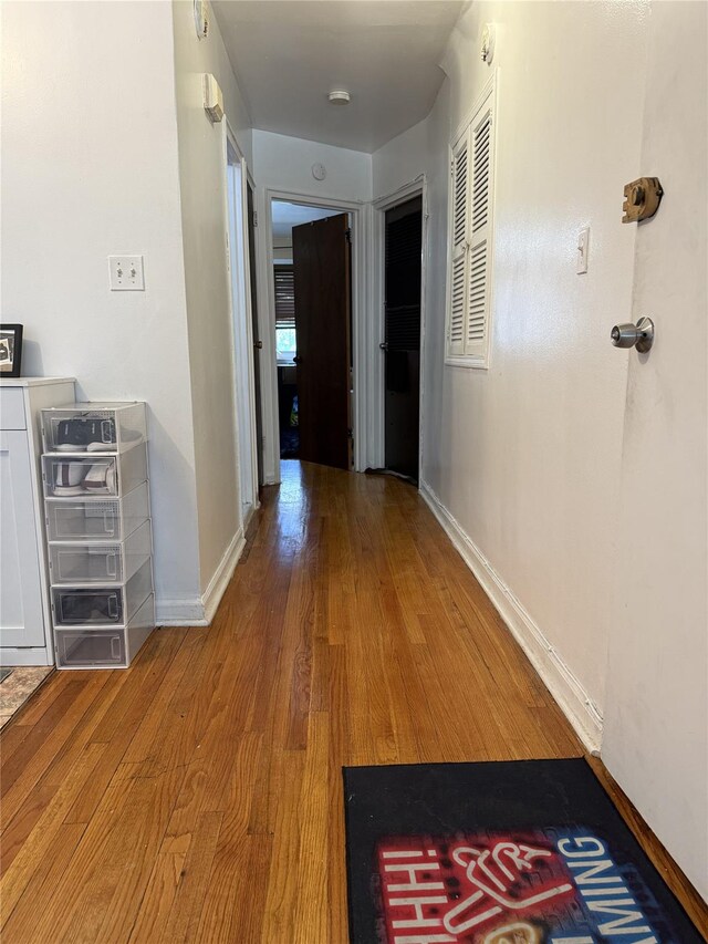 62-23 69th Pl, Middle Village, NY 11379 - hall with wood finished floors and baseboards