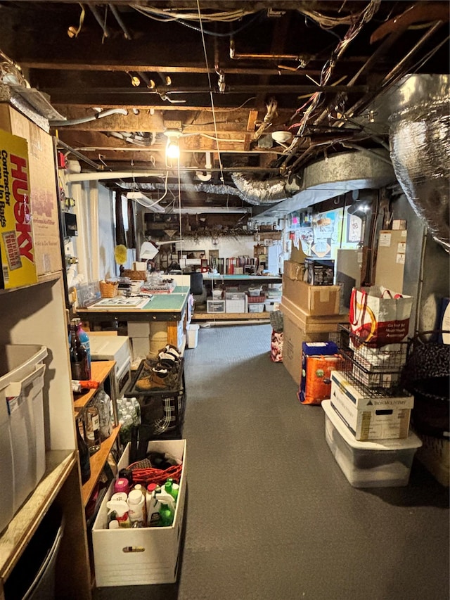 unfinished basement with a workshop area