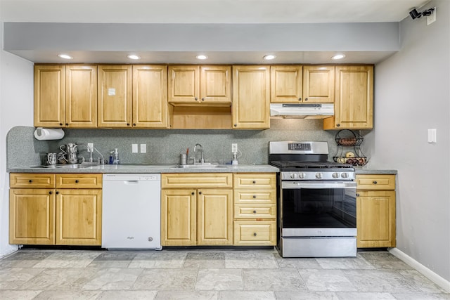 12 Jay Ct, Monsey, NY 10952 - kitchen featuring stainless steel range with gas stovetop, white dishwasher, under cabinet range hood, a sink, and backsplash
