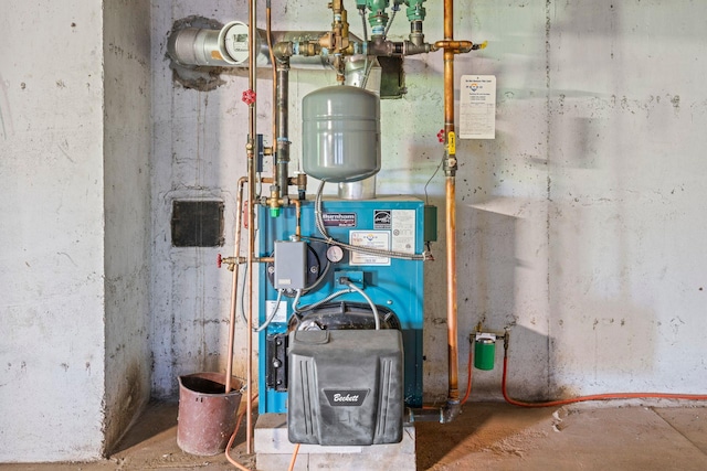 65 Preston St, Huntington, NY 11743 - utility room featuring a heating unit