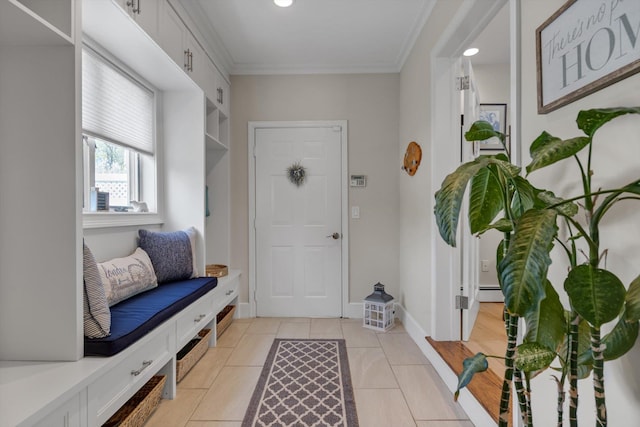 mudroom featuring crown molding, a baseboard radiator, recessed lighting, and light tile patterned flooring