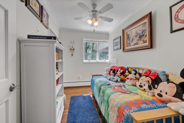 bedroom featuring crown molding, a baseboard radiator, a ceiling fan, and wood finished floors