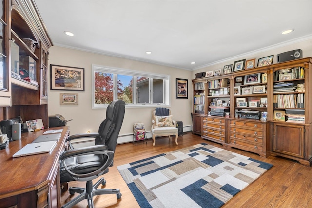office featuring crown molding, wood finished floors, and baseboard heating