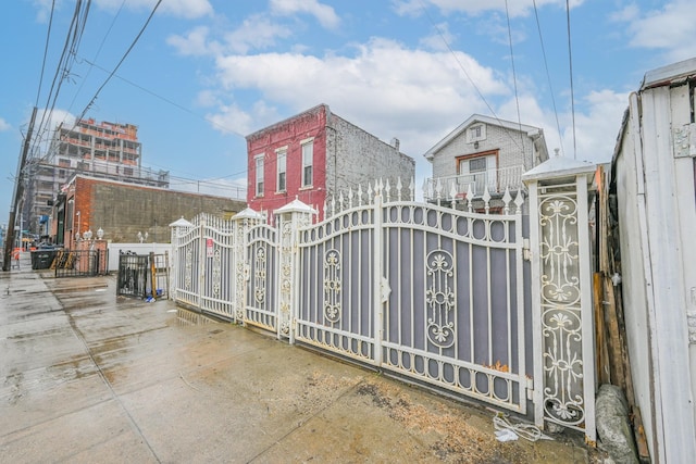 view of gate featuring fence