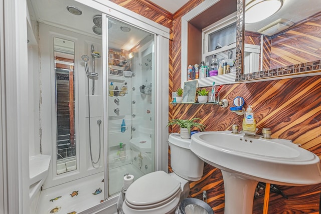 full bathroom featuring toilet and a shower stall