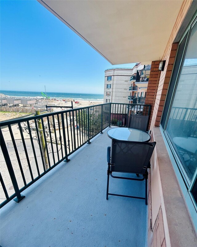 136 Bch 117th St Unit 410, Rockaway Park, NY 11694 - balcony with a water view