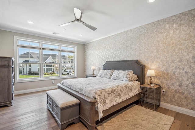 20105 Aspenwood Dr, Plainview, NY 11803 - bedroom featuring baseboards, wallpapered walls, wood finished floors, ornamental molding, and a ceiling fan