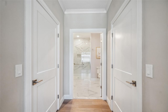 20105 Aspenwood Dr, Plainview, NY 11803 - hall featuring light marble finish flooring, crown molding, and baseboards
