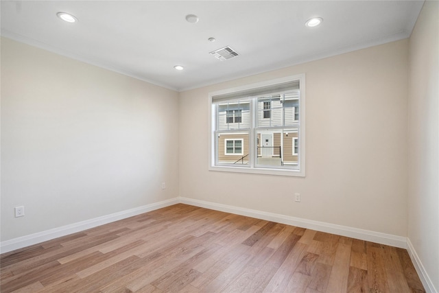 20105 Aspenwood Dr, Plainview, NY 11803 - spare room with light wood-type flooring, crown molding, baseboards, and recessed lighting