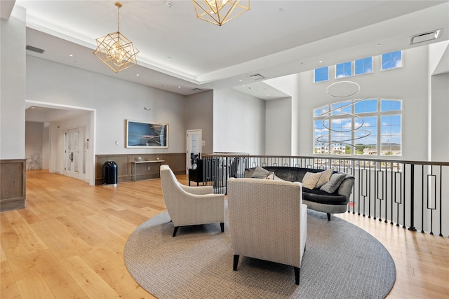 20105 Aspenwood Dr, Plainview, NY 11803 - common area featuring a towering ceiling, recessed lighting, and a wainscoted wall