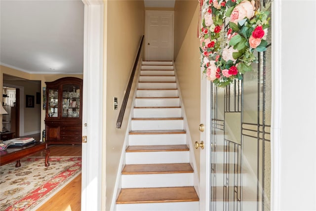 487 Emerson Pl, Valley Stream, NY 11580 - stairway with ornamental molding and wood finished floors