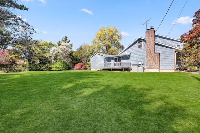 view of yard with a deck