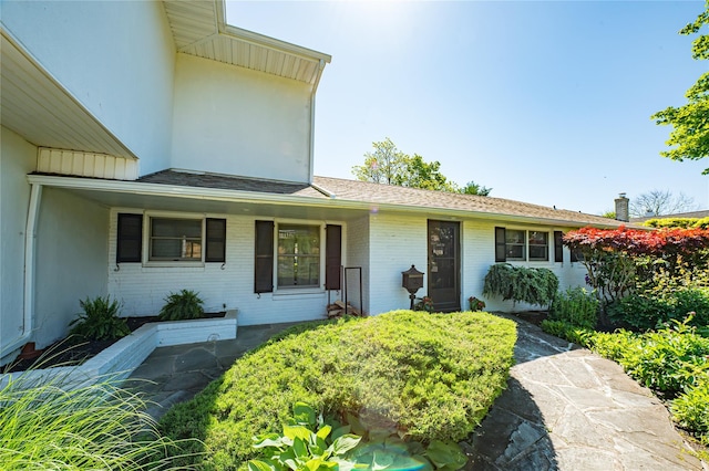 137 Melbury Rd, Babylon, NY 11702 - view of front of property featuring brick siding