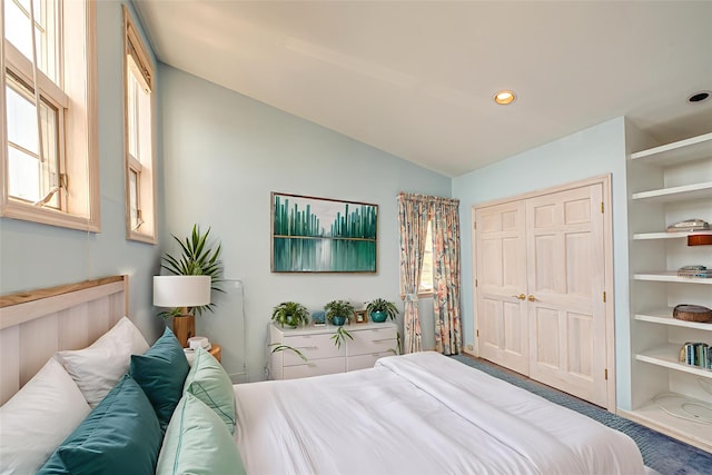 137 Melbury Rd, Babylon, NY 11702 - carpeted bedroom featuring lofted ceiling, recessed lighting, and a closet