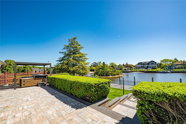 137 Melbury Rd, Babylon, NY 11702 - view of patio featuring a water view and a hot tub
