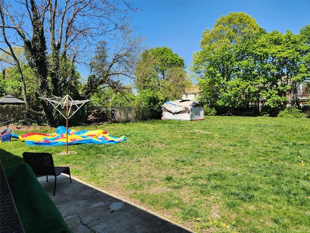 view of yard with fence