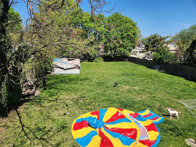 view of yard featuring fence