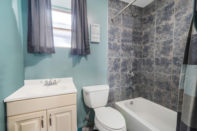 bathroom featuring vanity, toilet, and shower / tub combo with curtain