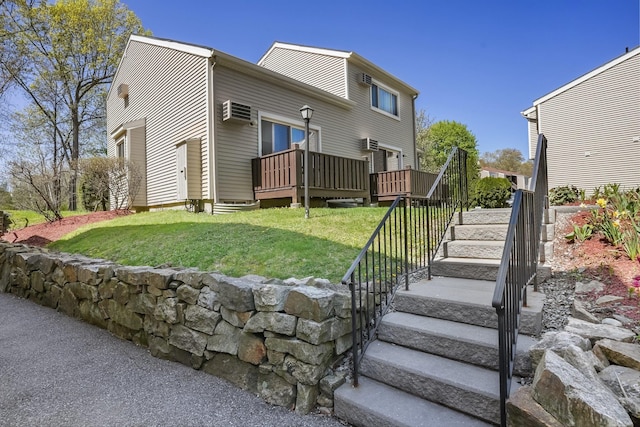 view of yard with a wooden deck and stairs
